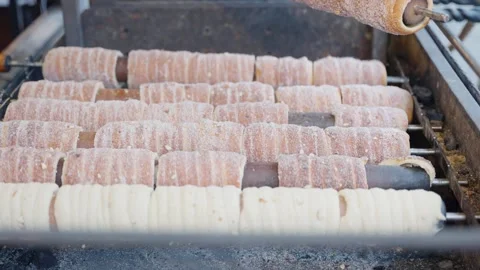 Chimney Cakes Cooling in Neat Rows After Baking Stock Footage 324003581