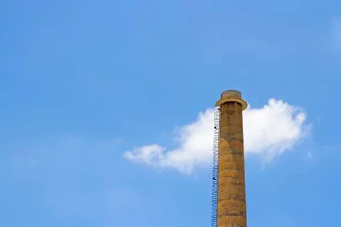 Chimney with cloud on blue sky Stock Photos