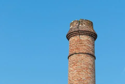 Chimney made of bricks in ruins Stock Photos