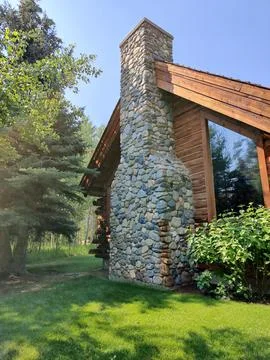 Chimney made of stone Stock Photos