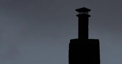 CHIMNEY OR BUILDING STRUCTURE AT NIGHT WITH CLOUDS PASSING Stock Footage 131129368