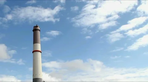 Chimney of power plant  using gas on blue cloudy  sky. Time lapse Stock Footage 47736996