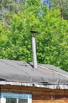 Chimney on the roof Foto stock