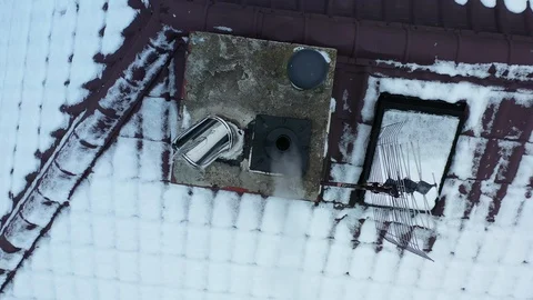 Chimney with smoke coming out from a single family house Stock Footage 100795434