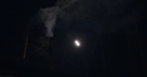 Chimney Smoke at Night Backlit Stock Footage 147117384