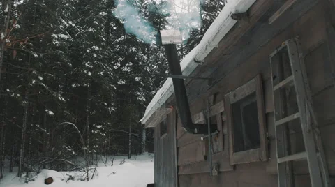 Chimney Smoke from Rustic Cabin Fire Place. Stock Footage 59786832