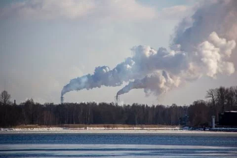 Chimney Smoking Stack. Air Pollution and Climate Change Theme. 库存照片