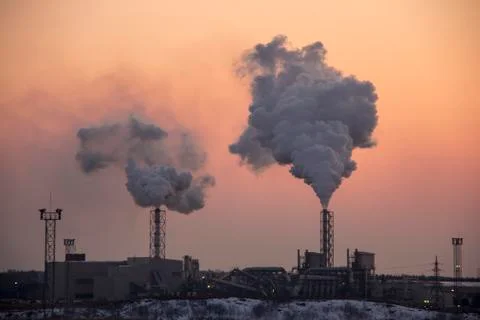 Chimney Smoking Stack. Air Pollution and Climate Change Theme. 库存照片