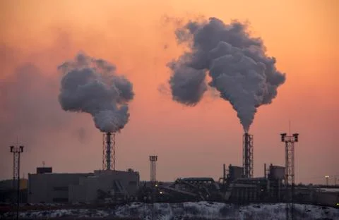 Chimney Smoking Stack. Air Pollution and Climate Change Theme. Фото