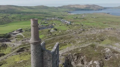 Chimney stack of old copper mines in West Cork Ireland on a spring day Video stock 242740953