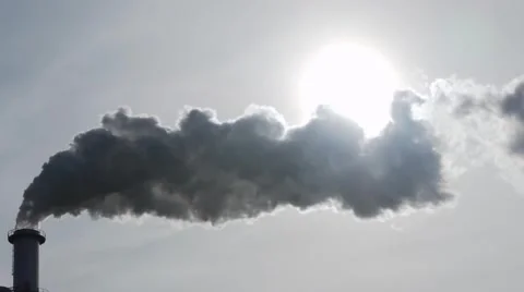 Chimney Steam that hides Sun Stock Footage 1076576