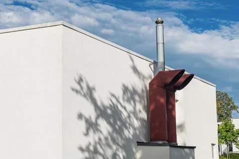 Chimney structure with shadows under a blue sky in the afternoon Photos