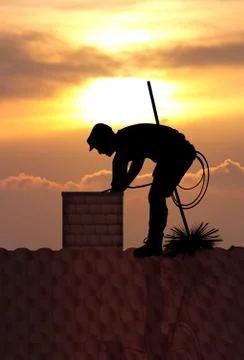 Chimney sweep at sunset Stock Illustration