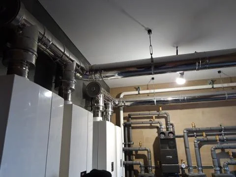 The chimney wall boiler cascade Stock Photos