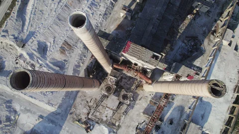 Chimneys of an abandoned factory with movement from bottom to top looking down Stock Footage 330686875