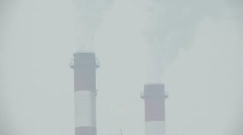 Chimneys, air pollution during strong winter 1 Stock Footage 10819292