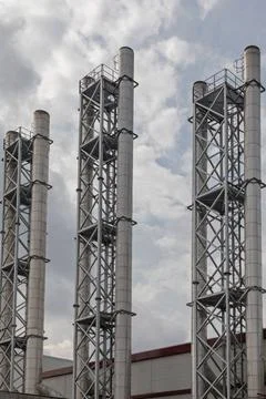 Chimneys Chimney Tower Structure at Heating Plant Building Copyright: xZoo... Fotos de archivo