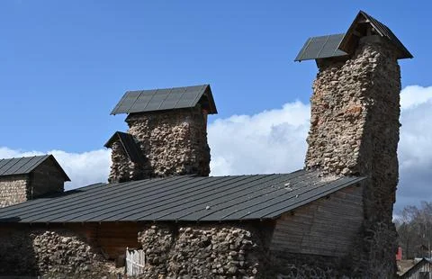 Chimneys of an old brick building Foto stock