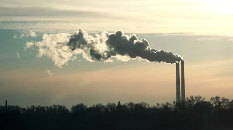 Chimneys of Power Plant at Sunset. Air Pollution Concept. Stock Footage