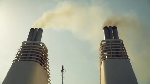Chimneys of a ship smoking into the blue sky Stock Footage 314857774