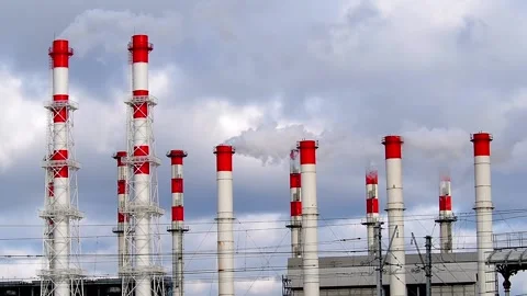 The chimneys from which the smoke comes out against the background of the sky. Stock Footage 171149385