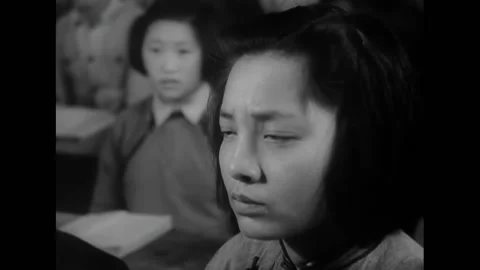 CHINA - 1944 - High school students pay close attention to their teacher in Stock Footage 254201504