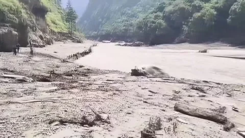 China: 3 dead, 265 missing after mudslide hits border port in China's Xiz... Stock Footage 343733648