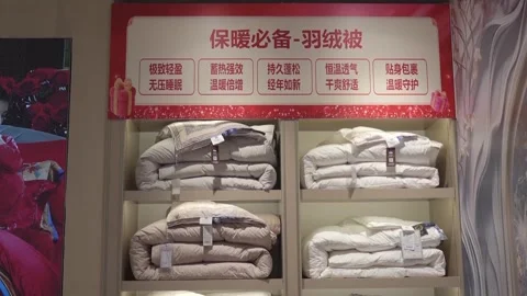 China: Bedding sales soar in Shanghai as temperatures drop Stock Footage 324610053