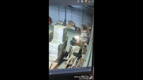 China: Box falls near sleeping worker in warehouse close call in Inner Mo... Stock Footage 337523529