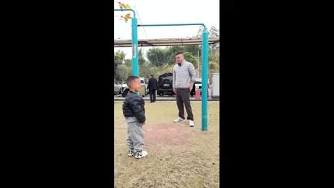 China: Boy bumps head on pull-up bar in Henan, China Stock Footage 330829785