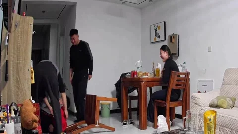 China: Boy falls after sitting on chair backrest in Shandong, China Stock Footage 330458965