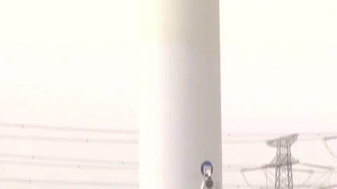 China: China's Gobi Desert wind farm uses AI acoustic devices for turbine... Stock Footage 332046385