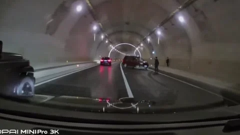 China: Chinese driver makes split second move to avoid accident car in tu... Stock Footage 334099355