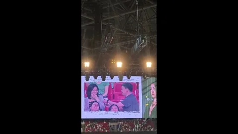 China: Chinese man pretends to propose after being shown on concert big s... Stock Footage 336524341