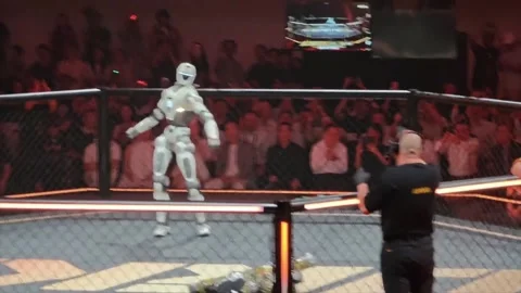 China: Combat robot jumps into mocking dance after knocking rival down in... Stock Footage 340313549