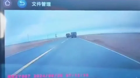 China: Dashcam captures dramatic head-on crash between two trucks Stock Footage 320640538