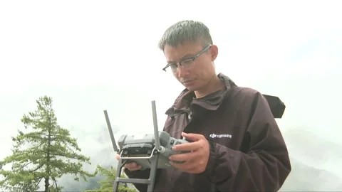 China: Drones deployed to provide crucial aerial assistance after deadly ... Stockbeeldmateriaal 344271109
