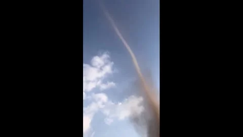China: Dust devil spins beside road in Henan, China Stock Footage 336568448