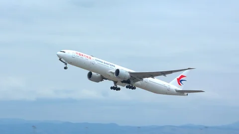 China Eastern Boeing 777 Taking Off from San Francisco SFO Stock Footage 124821927