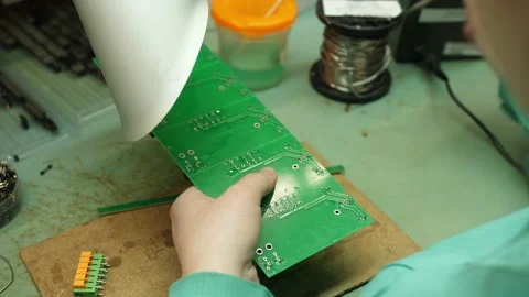 China Electronics Facility: Female Engineer Does Printed Curcuit Motherboard Sol Stock Footage 166314235