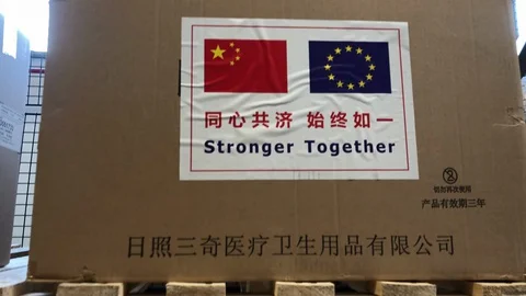 China to Europe medical supplies shipment box on a pallet. Stronger together Stock Footage