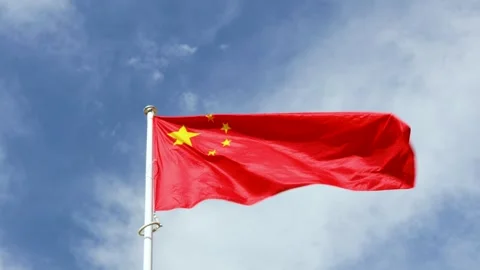 China flag waving in wind against blue sky Video stock 255233699