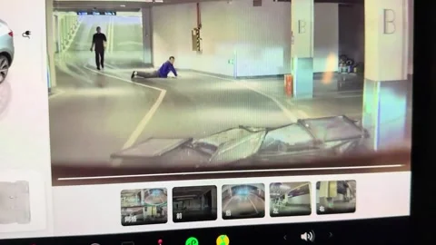 China: Hapless hardware store worker loses control of trolley on car park... Stock Footage 320618537