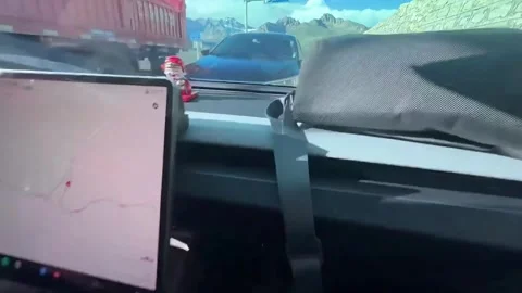 China: Head-on collision narrowly avoided on mountain highway in Tibet, C... Stock Footage 340405219