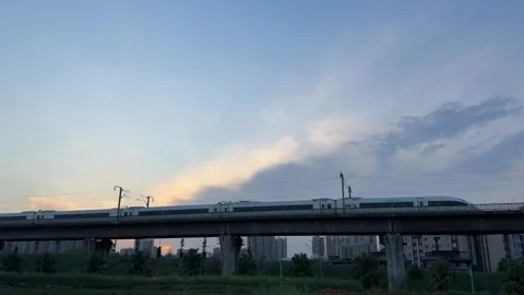 China High Speed Bullet Train Passing Modern Residential District in Chengdu Vidéo 334696656