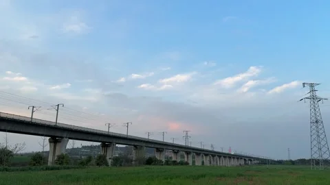 China High Speed Bullet Train Passing Over Elevated Railway Viaduct in Cheng Stock Footage 334696764