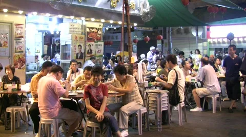 China Hong Kong Temple street Dai pai dong night market food stall Stock Footage