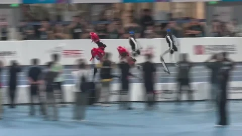 China: Humanoid robots sprint into safety barrier after 100-meter race in... Stock Footage 344039635
