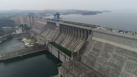 China infrastructure and engineering - drone shot of concrete gravity dam Stock Footage 108798580