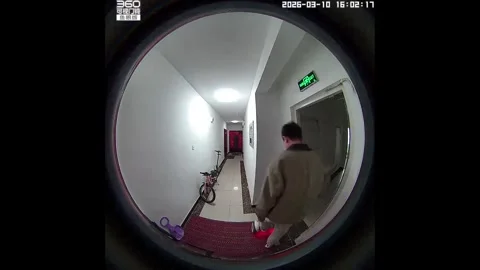 China: Man falls from hoverboard after hitting bike in Shaanxi, China Video stock 330791097
